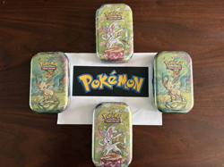 4 x Pokemon TCG Prismatic Evolutions Mini Tins Brand new & Sealed ✅ Fast Ship✅ - Image 2