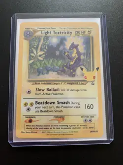 Pokemon TCG Light Toxtricity SWSH137 English Holo Card Celebrations Promo - Image 1