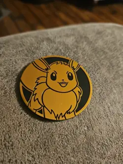 Prismatic Evolutions Eevee 2025 Pokemon Day Promo Coin - Image 1