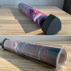 1 BCW Clear Tri-oval Playmat Tube With 2 Black Dice and Caps - Image 1