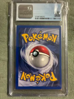 1999 Pokemon Base Set Unlimited Poliwrath 13/102 Holo CGC 9 - Image 2