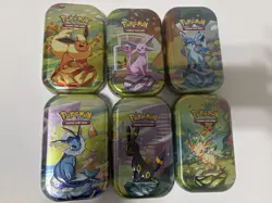 Pokemon Lot of 6 EMPTY Mini Tins With Art Cards And Coins - Image 1