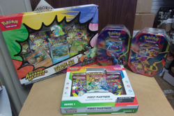 POKEMON ASCENDED PIN + FIRST PARTNER ILLUSTRATION + (2) MEGA CHARIZARD TINS - Image 1