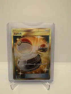 Switch Secret Gold Trainer Item 160/149 Sun & Moon Base Set Holo Pokemon - Image 1