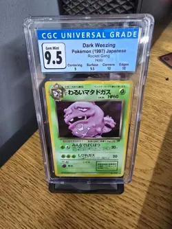 1997 Japanese Rocket # 110 Dark Wheezing Pokemon CGC 9.5 Blue CGC 10 - Image 1