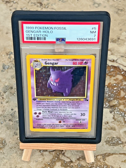 1999 Pokemon Fossil Gengar 1st Edition Holo #5 PSA 7 - Image 1