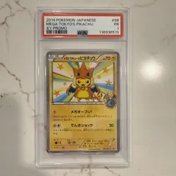 2014 PSA 1 Pokemon Japanese XY Promo #098 Megatokyo's Pikachu Poncho Charizard - Image 1