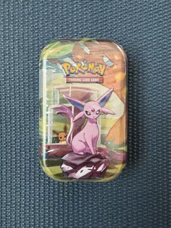 Pokemon Prismatic Evolution Sealed Mini Tin - Espeon - Image 1