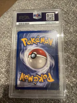 1999 POKEMON FOSSIL 1ST EDITION #53 PSYDUCK PSA 7 - Image 2