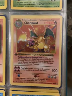 Mint charizard card held for juicy - Image 1