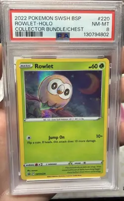 PSA 8 Rowlet Holo 2022 Pokemon Collector Chest #SWSH220 - Image 1