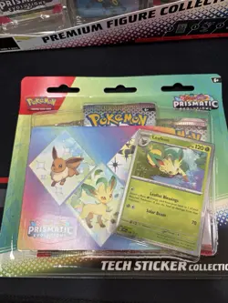 Pokemon TCG Prismatic Evolutions Leafeon Tech Sticker Collection Sealed - Image 1