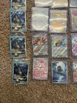 Huge lot of over 50 pokemon SIR holos and promo packs - Image 3