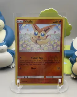 Victini 26/236 Unified Minds Reverse Holo Rare Pokemon Card - Image 1