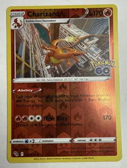 Charizard 010/078 NM Reverse Holo Rare Flying Downtown Art Pokemon GO Stamp Card - Image 1