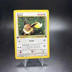 Pokemon Card Eevee 1st Edition 55/82 Team Rocket WOTC 2000 NM -j - Image 1