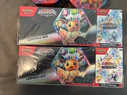2x Pokemon Prismatic Evolutions Surprise Box/Booster Sam's Club Bundle w/ 2 Tins - Image 2