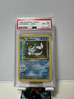 1999 POKEMON JUNGLE #12 VAPOREON-HOLO PSA 8 - Image 1
