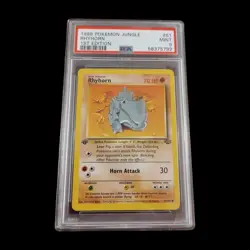 1999 Pokemon Jungle #61 Rhyhorn 1st Edition PSA 9 - Image 1