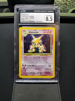 CGC 9 NM/MINT + Alakazam Holo Base Set Unlimited 1/102 Pokemon card - Image 1