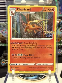 POKEMON CHARIZARD #010/078 RARE HOLOFOIL NM POKEMON GO CARD - Image 1