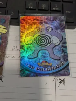 Poliwrath #62 Pokemon Topps Series 1 Card Blue Label Rainbow First Print - Image 1