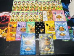 x27 Poncho Eevee & Other Miscellaneous Eevee Pokemon Trading Card Sleeves - Image 1