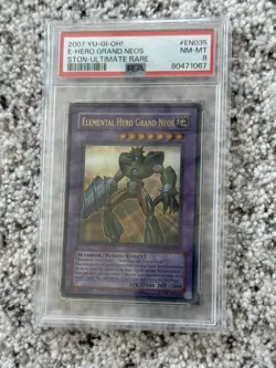2007 YU-GI-OH! STON-STRIKE OF NEOS #EN035 E-HERO GRAND NEOS STON PSA 8 - Image 1