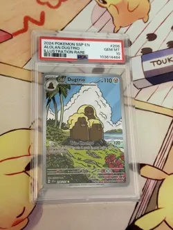 Alolan Dugtrio 208/1911 Surging Sparks PSA 10 Pokemon Card - Image 1