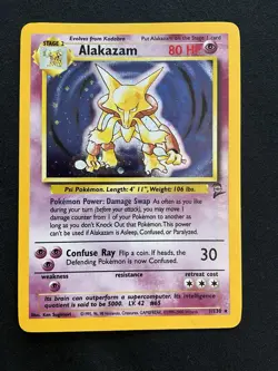 Pokemon TCG Alakazam 001/130 Base Set 2 Holo NM - Image 1