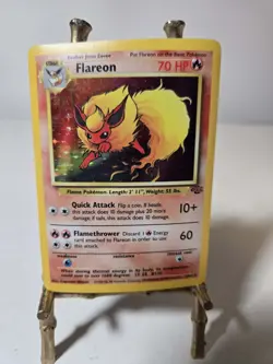 1999 Pokemon Jungle Flareon 3/64 Holo Rare Card Is Curved - Image 1