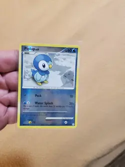 LP Pokemon TCG Piplup Diamond & Pearl 93/130 Reverse Holo Common w top loader - Image 1