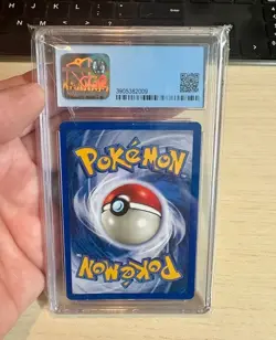 1999 Pokemon Charizard Holo CGC Universal Grade 7 NM Game #4/102 - Image 2