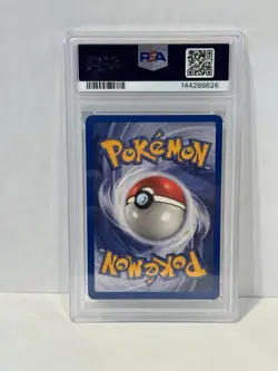 2004 Pokemon EX Psyduck Reverse Holo Foil Team Rocket Returns PSA 7 Sunset Swirl - Image 2