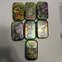 Prismatic evolutions Mini tins bundle x 7 Pokemon Cards TCG Sealed - Image 1