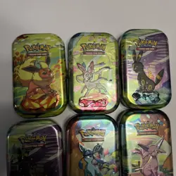 Prismatic evolutions Mini tins bundle x 7 Pokemon Cards TCG Sealed - Image 2