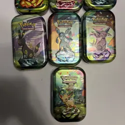 Prismatic evolutions Mini tins bundle x 7 Pokemon Cards TCG Sealed - Image 3