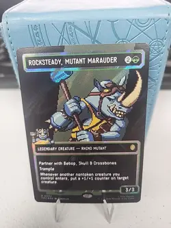 FOIL ROCKSTEADY, MUTANT MARAUDER (BORDERLESS) (SURGE FOIL) (094) Teenage Mutant - Image 1