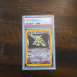 2000 Pokemon TCG Dark Alakazam Holo Rare Card #1/82 PSA 7 Near Mint - Image 1