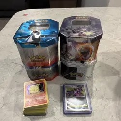 2005 Pokemon TCG Card Lot with Tins, holos, and 7 sleeved holos - Image 1