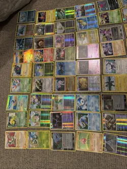 2005 Pokemon TCG Card Lot with Tins, holos, and 7 sleeved holos - Image 3