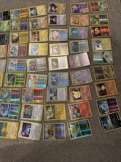2005 Pokemon TCG Card Lot with Tins, holos, and 7 sleeved holos - Image 4