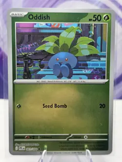 Reverse Holo Oddish 001/094 Common ME02: Phantasmal Flames Pokemon NM - Image 1