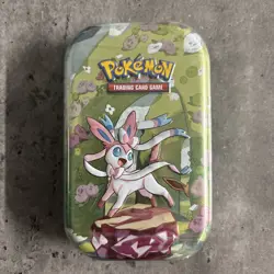 Pokemon: Scarlet and Violet Prismatic Evolutions Mini Tin - Vaporeon - Image 1