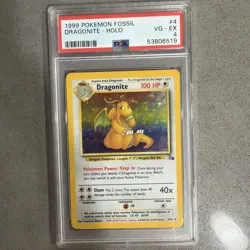 1999 POKEMON FOSSIL #4 DRAGONITE-HOLO PSA 4 - Image 1