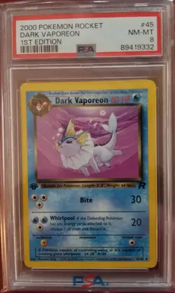 2000 Pokemon Rocket 1st Edition Dark Vaporeon PSA 8 - Image 1
