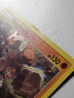 COSMOS HOLO Regirock 53/111 - SWIRL - EXCLUSIVE Crimson Invasion Pokemon Card - Image 2
