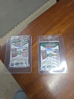 Leafeon and Espeon Stamped Prismatic Evolutions Promo Pokemon Card - Image 2