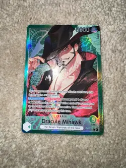 One Piece OP14 The Azure Sea’s Seven - Dracule Mihawk OP14-020 Leader Alt Art - Image 1