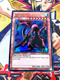 Harpie's Pet Dragon lcjw-en086 1st Edition (NM) Ultra Rare Yu-Gi-Oh! - Image 1